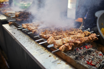 Grilled meat, barbecue. Christmas Fair. Street food.