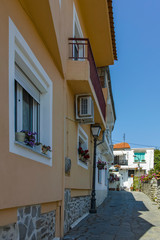 Typical street and houses at old town of city of Kavala, Greece