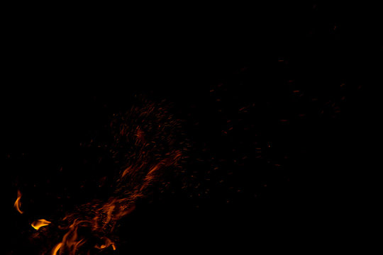 fire flame sparkles on dark night background empty copy space for your text here wallpaper pattern picture