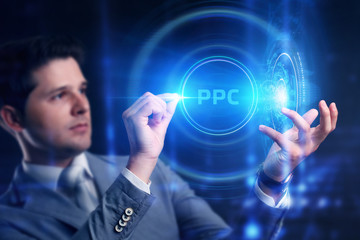 Business, Technology, Internet and network concept. Young businessman working on a virtual screen of the future and sees the inscription: PPC