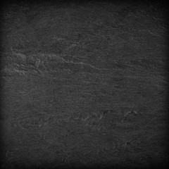 Dark grey black slate background or texture.