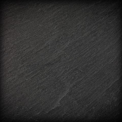 Dark grey black slate background or texture.