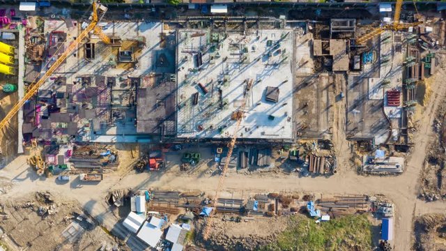 Time lapse Big Construction site with giant cranes, Aerial footage top view