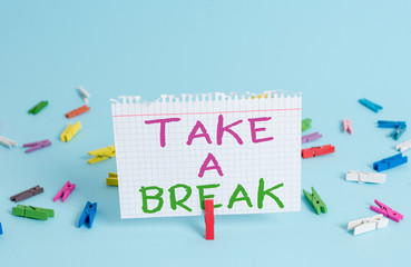 Word writing text Take A Break. Business photo showcasing Resting Stop doing something recreation time get out of work Colored clothespin rectangle square shaped paper light blue background