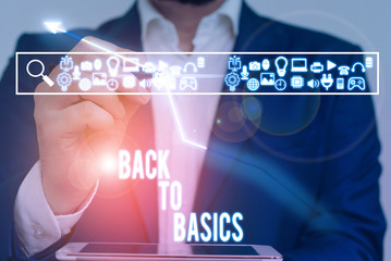 Writing note showing Back To Basics. Business concept for Return simple things Fundamental...