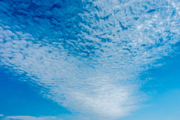 Blue sky with white clouds.