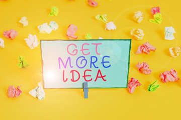 Text sign showing Get More Idea. Business photo showcasing Random Input Mind Map Picture Mock up Surveys Visualization Colored crumpled papers empty reminder white floor background clothespin