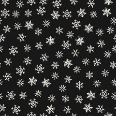 Vector snowflakes pattern. Winter Christmas decorative seamless background with small scattered snow flakes. Abstract black and white texture. Simple minimal monochrome ornament. Dark repeat design
