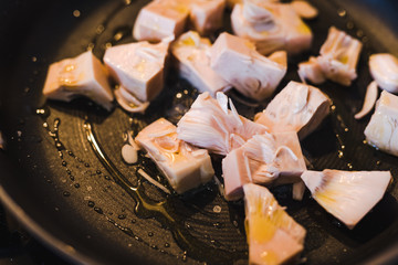 pulled jackfruit getting sauteed in a pan the fruit is used as mock chicken in vegan nutrition