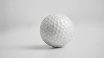 Old golf ball on white tone.