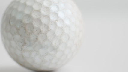 Old golf ball on white tone.