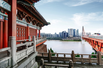 Obraz premium andscape of downtown near water of chongqing in blue sky