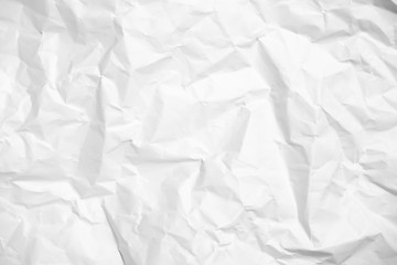 White crumpled paper texture background.
