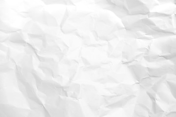 Obraz premium White crumpled paper texture background.