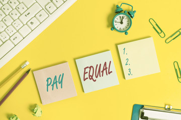 Writing note showing Pay Equal. Business concept for Principle of nondiscrimination in compensation...