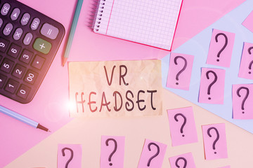 Writing note showing Vr Headset. Business concept for headmounted device that provides virtual reality for the wearer Mathematics stuff and writing equipment above pastel colours background