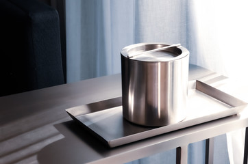 Stainless steel ice bucket.