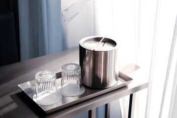 Stainless steel ice bucket.