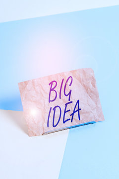 Word writing text Big Idea. Business photo showcasing Having great creative innovation solution or way of thinking Paper placed tilted above buffer wire on soft pastel multi colours backdrop