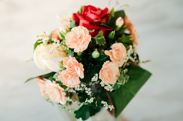 White and red rose vase with leaves and leaves