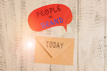 Handwriting text writing People Brand. Conceptual photo Personal Branding Defining demonstratingality through the labels Front view closed envelop speech bubble lying wooden vintage background