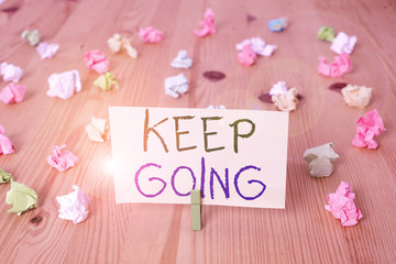 Conceptual hand writing showing Keep Going. Concept meaning make an effort to live normally when in...