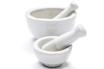 Herbs and medicine white mortars, Made by lime or ceramic on white background.