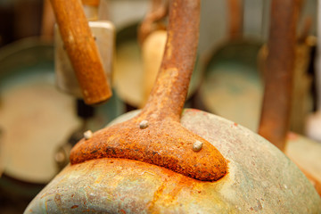Closeup on old rusted pot handle