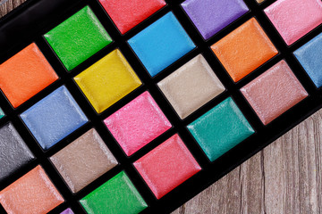 Colorful makeup palette, eye shadow in box.