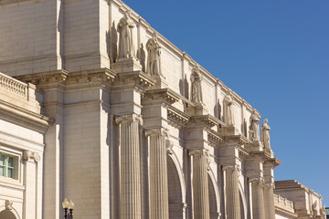 Union Station building facade in Washington DC, USA. Monumental building with statues under a clear blue sky. - 305596909