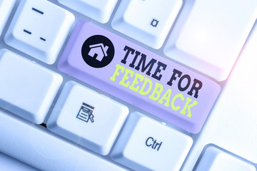 Conceptual hand writing showing Time For Feedback. Concept meaning Need to response or give critic on something Evaluation White pc keyboard with note paper above the white background