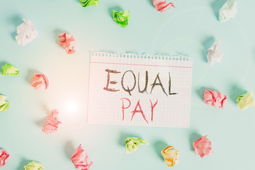 Fototapeta na wymiar Word writing text Equal Pay. Business photo showcasing Rights that individuals in the same workplace be given equal pay Colored crumpled rectangle shaped reminder paper light blue background