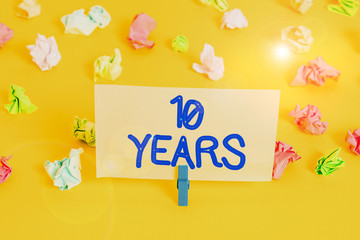 Handwriting text writing 10 Years. Conceptual photo Remembering or honoring special day for being...