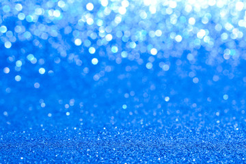 sparkles of blue glitter abstract background	