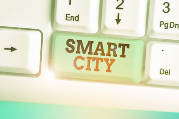 Conceptual hand writing showing Smart City. Concept meaning urban area that uses different...