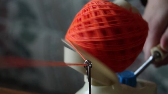 Orange Yarn Ball Winding Close Up 2