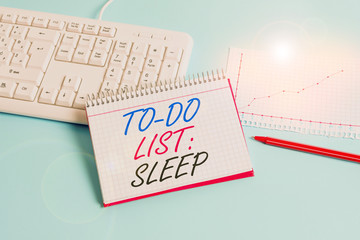 Text sign showing To Do List Sleep. Business photo showcasing Things to be done Priority object is to take a rest Paper blue desk computer keyboard office study notebook chart numbers memo