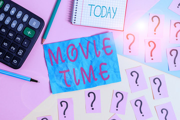 Handwriting text writing Movie Time. Conceptual photo the scheduled or actual time at which a show or film begins Mathematics stuff and writing equipment above pastel colours background