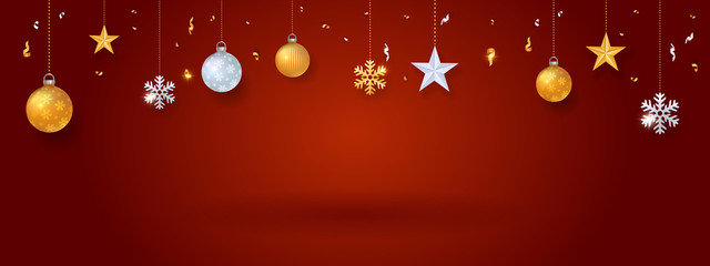 Red Christmas background with balls and stars decoration and copy space