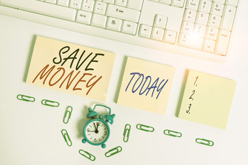 Handwriting text Save Money. Conceptual photo store some of your cash every month to use them...