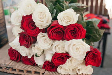 huge bouquet of white and red roses