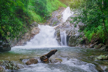 beautiful waterfall in rainforest at National Park, Thailand