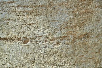 Natural stone background close-up. Sandstone stone texture.