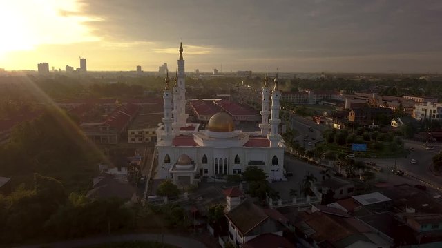 Aerial view of a public mosque during sunrise in Pasir Pekan Kelantan, Malaysia.