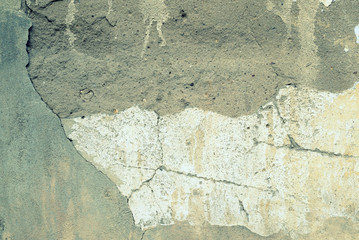 Wall of an old abandoned house close-up. Abstract background