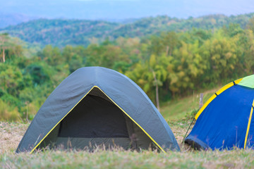 Tourist tent in camp among meadow in the mountain at national park