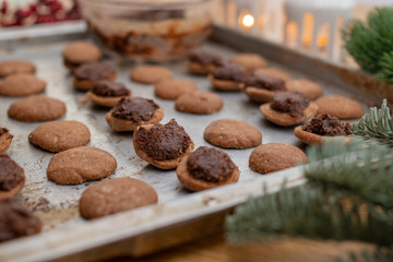 Hazelnut shortbread sandwiches filled with chocolate cream