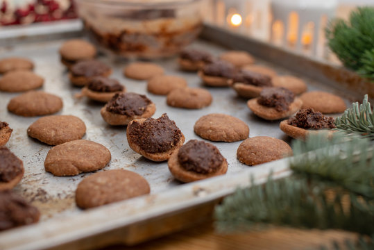 Hazelnut shortbread sandwiches filled with chocolate cream