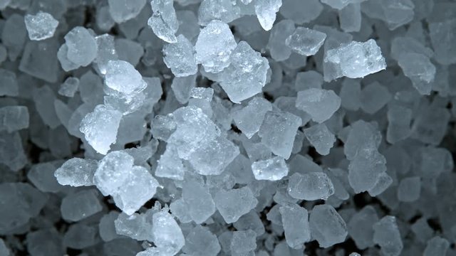 Super Slow Motion Shot of Exploding Crusher Ice Towards Camera at 1000fps. Filmed with High Speed Cinema Camera in 4K Resolution.