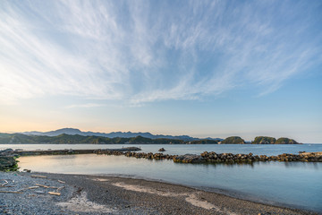 beautiful twilight sunset with blue sky high peak mountains mist fog green forest  park ocean sea idea for backpacker guiding backpacking camping campfire relax hiking  long weekend at Wakayama Japan
